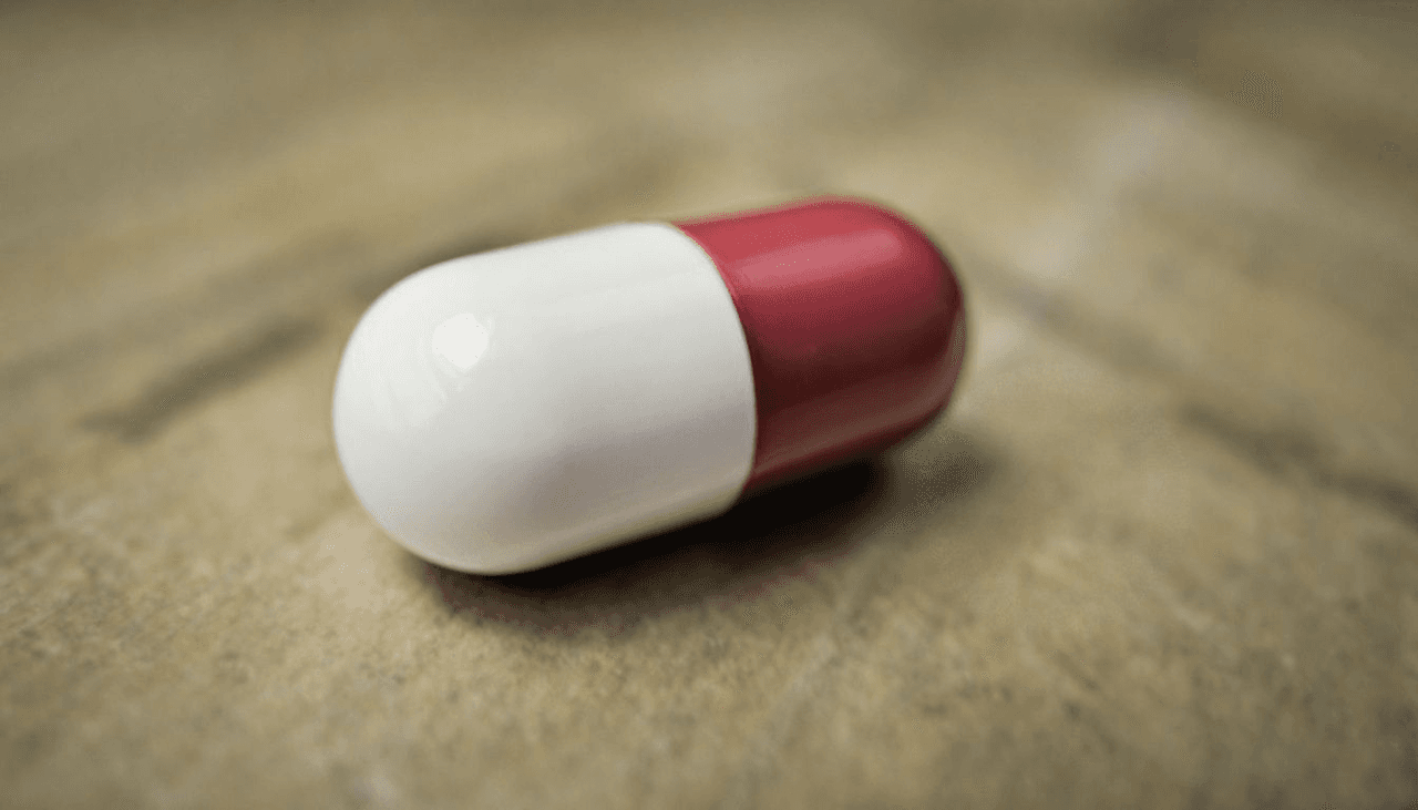 An illustration of a k 18 pill showing its unique features.