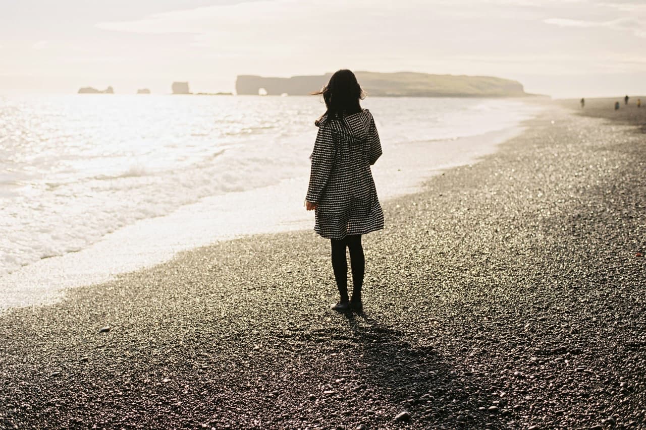 woman on beach alone